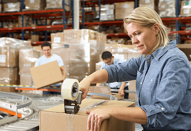 Person packing boxes